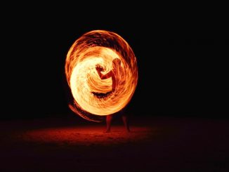 Firedancing man by pj24dm (Unsplash.com)