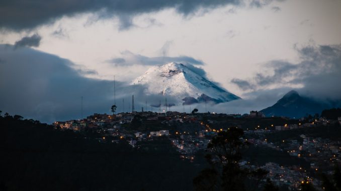 Woke up early to catch a glimpse of Cotopaxi volcano from the rooftop of my grandparentsâ home before the usual daytime clouds shrouded it. They say one of the defining characteristics of ecuadorians is their ability to conduct their lives unfazed under the shadow of active volcanos, like this one. I tried to capture that feeling, the sprawling city still sleeping under the shadow of the colossus. by multimaniaco (Unsplash.com)