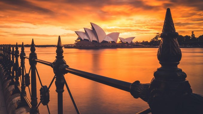 A stunning sunrise, captured behind the famous Sydney Opera House. Image taken at Circular Quay, Sydney, Australia. by liampozz (Unsplash.com)