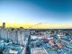 Shot from the top of the Hotel Monteleone at Sunset in New Orleans. This is looking towards Bourbon Street. It was shot during my Honeymoon there. by scottwebb (Unsplash.com)