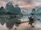 Sunset on the Li River as the few remaining cormorant fisherman pack their nets for the night. by sam_beasley (Unsplash.com)